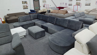 Sofa narożna Tomino U XL z ekspozycji z podnóżkiem Malta Cosmic