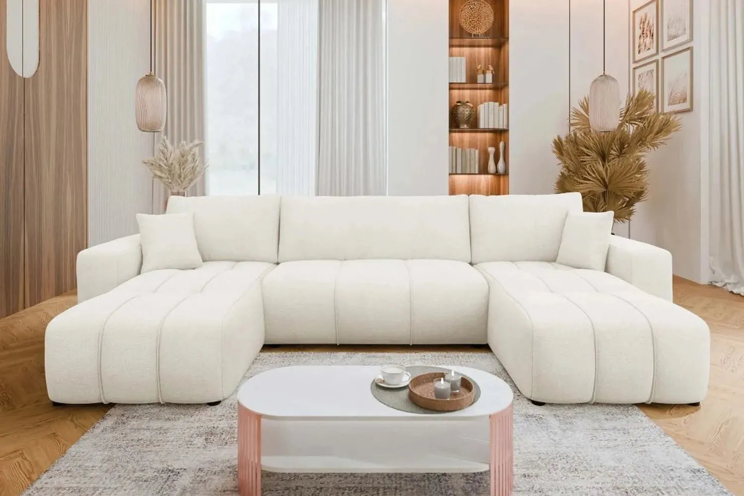 White sectional sofa in a modern living room with a coffee table and decorative items.