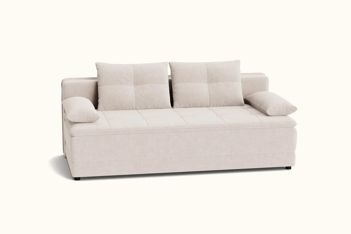 A modern two-seater sofa upholstered in a light beige textured fabric, featuring two square tufted back cushions, two matching side bolsters, and a low-profile rectangular base, shown against a plain off-white background.