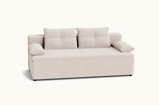 A modern two-seater sofa upholstered in a light beige textured fabric, featuring two square tufted back cushions, two matching side bolsters, and a low-profile rectangular base, shown against a plain off-white background.